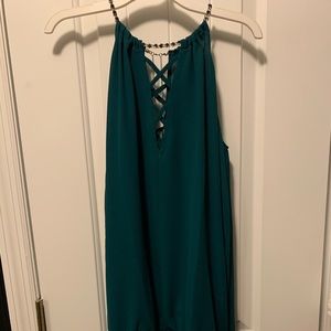 Green long sleeve, open shoulder with chain